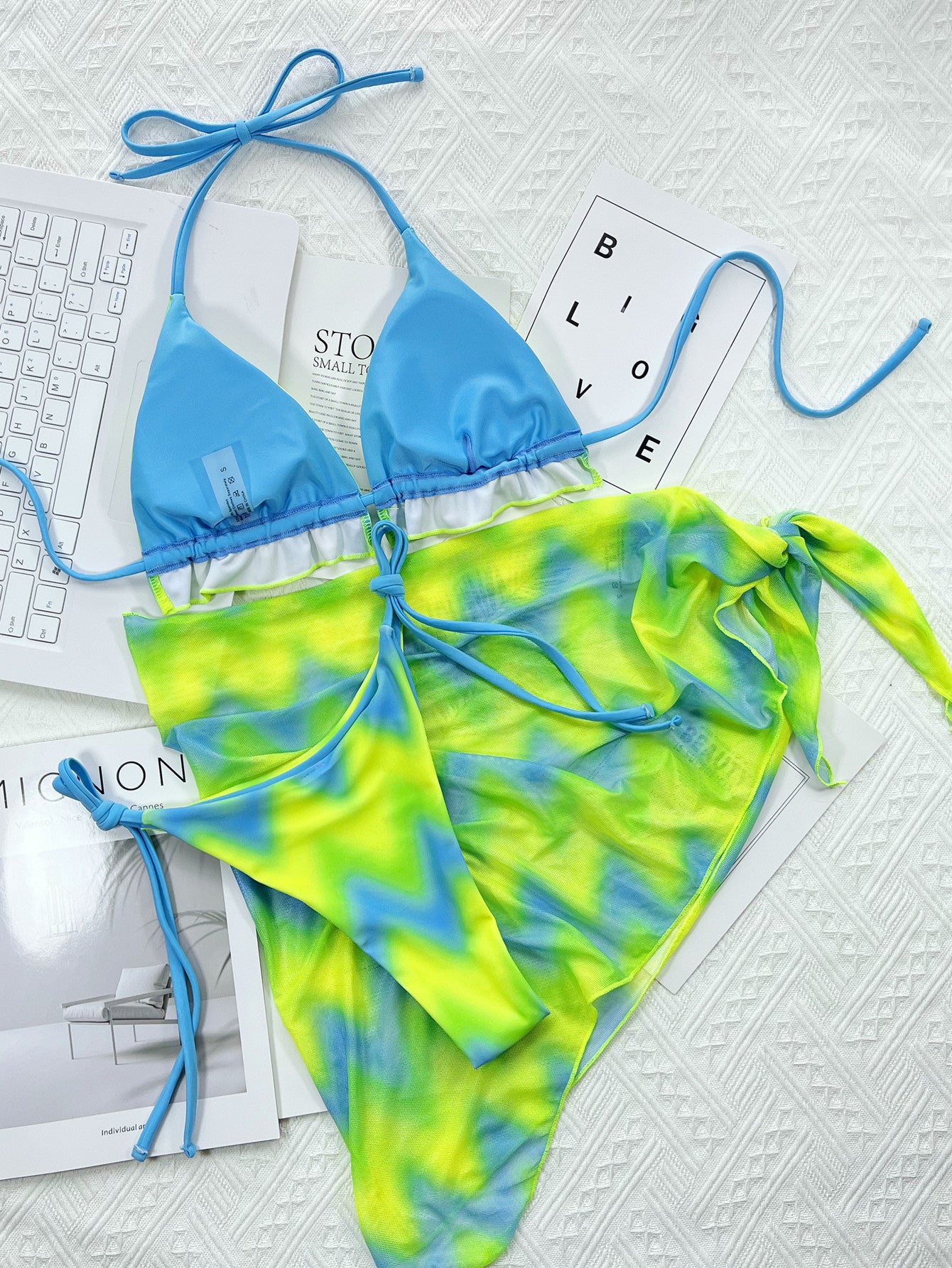 3 piece bikini set with triangle top with high Cut tie side bottoms and a scarf