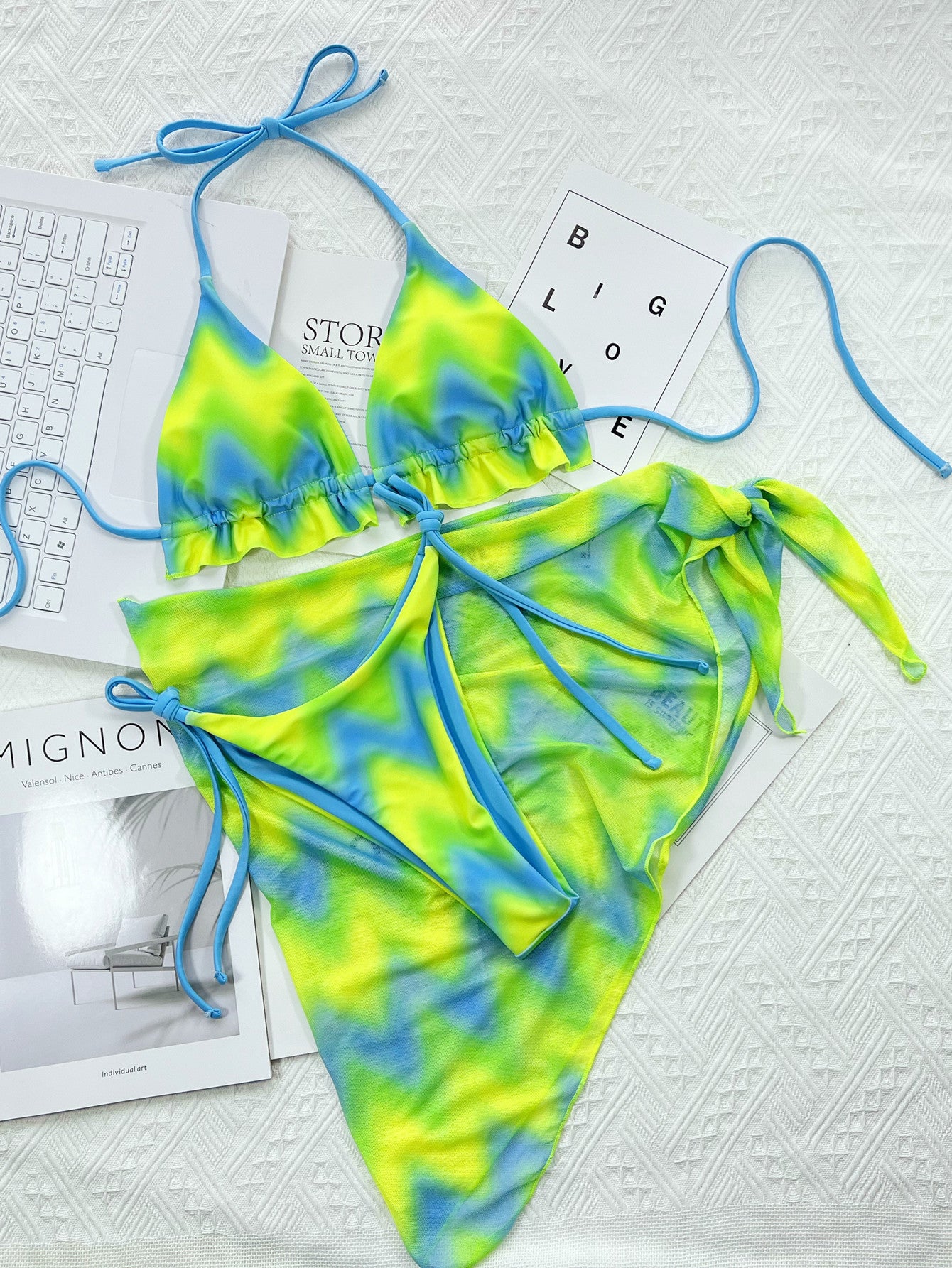 3 piece bikini set with triangle top with high Cut tie side bottoms and a scarf